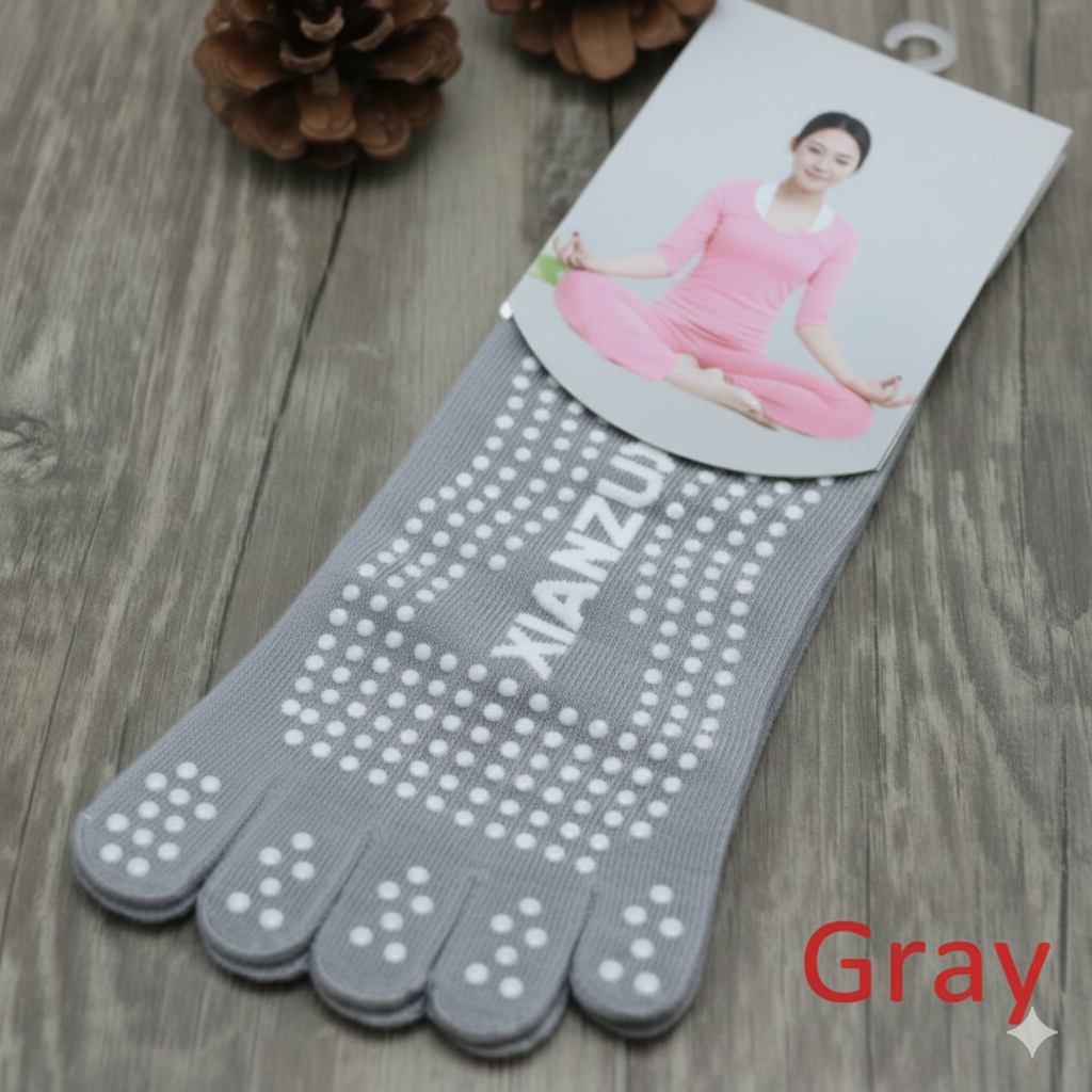 جوراب‌های یوگا و پیلاتس پنجه‌دار ضد لغزش (Toe Socks) | حفظ تعادل و تقویت پایداری حرکت! طوسی