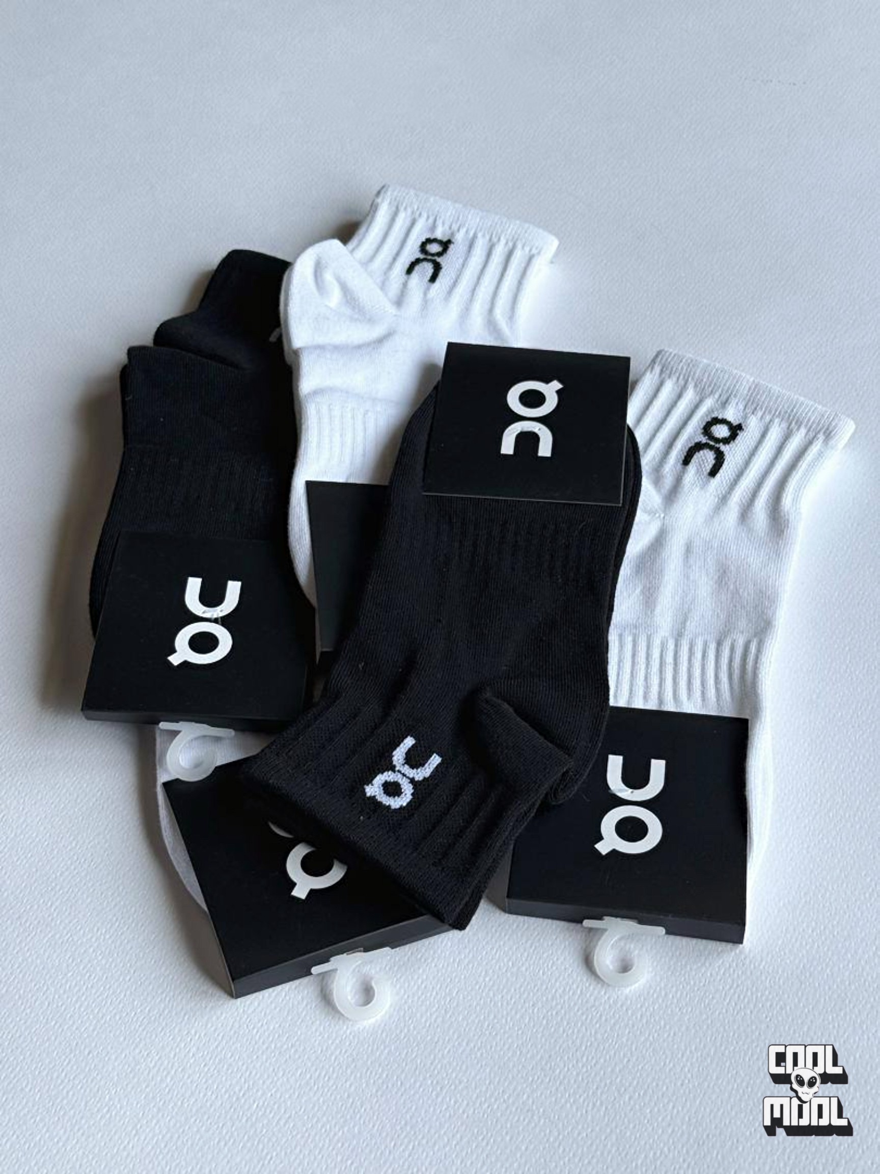 some on running socks in white and black