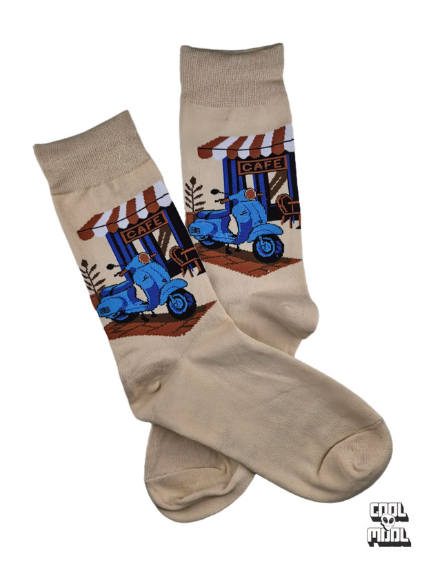Classic blue Vespa scooter parked outside a vintage European cafe woven crew socks on beige cotton fabric.