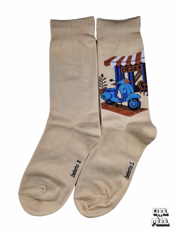 Classic blue Vespa scooter parked outside a vintage European cafe woven crew socks on beige cotton fabric.