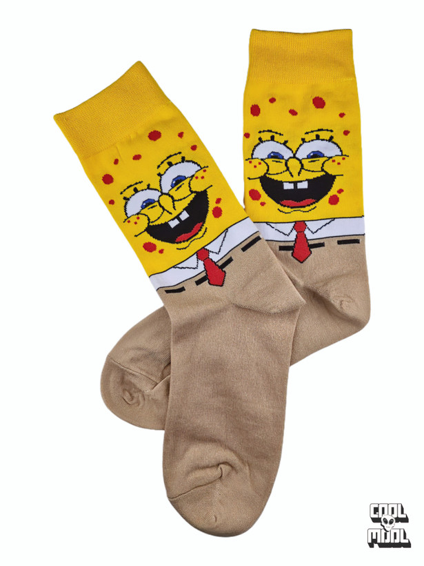 SpongeBob SquarePants character crew socks featuring a bright yellow smiling face with red tie and beige brown foot section woven on cotton fabric